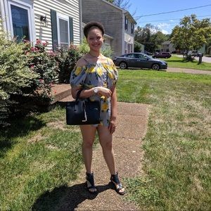 Short floral romper by hint of blush brand